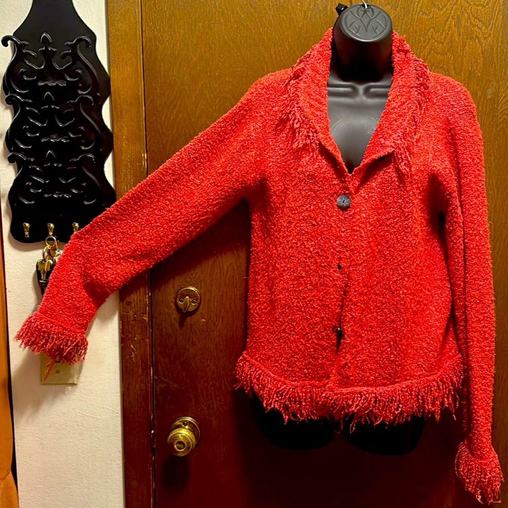 Rose Wind River cardigan with fringe around collar, bottom and cuffs